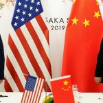 China's central bank calls on state banks to reduce US dollar purchases