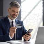 businessman with credit card and laptop
